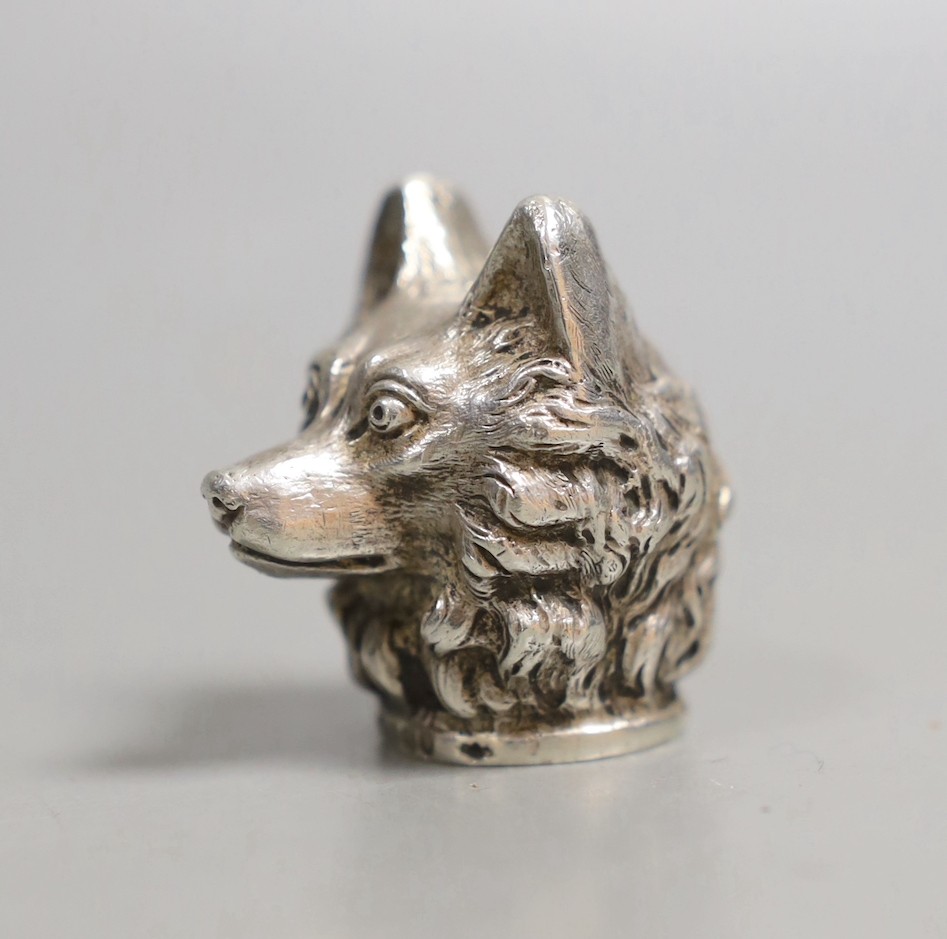 A late Victorian silver cane handle?, modelled as a dog's head, import marks for London, 1897, 35mm.